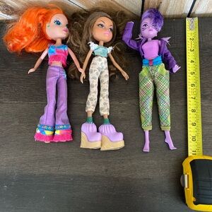 Lot of three dolls.